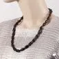 Preview: Kette 20x10mm Winkelperle Kunststoff schwarz-gold-marmoriert glänzend 60cm Preview: Kette 20x10mm Winkelperle Kunststoff schwarz-gold-marmoriert glänzend 60cm