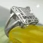 Preview: Ring 16mm mit vielen Zirkonias glänzend rhodiniert Silber 925 Ringgröße 54 Preview: Ring 16mm mit vielen Zirkonias glänzend rhodiniert Silber 925 Ringgröße 54